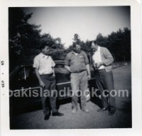 Robert Dunfield, James Troutman, Dan Blankenship outside of Oak Island Motel